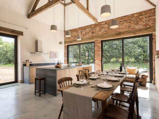 open plan kitchen/diner with patio doors | Old Hall Farm Barn, Kerdiston, near Norwich