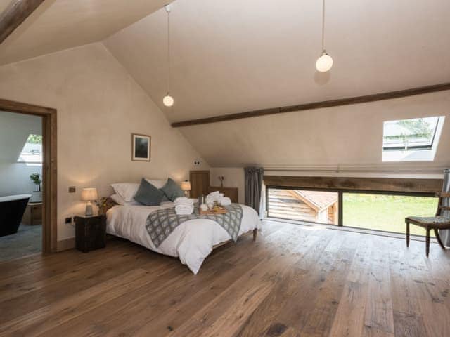 Large double bedroom with en-suite | Old Hall Farm Barn, Kerdiston, near Norwich