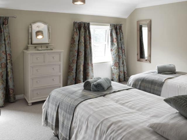 Inviting bedroom with twin beds | Halfehill Cottage, Richmond