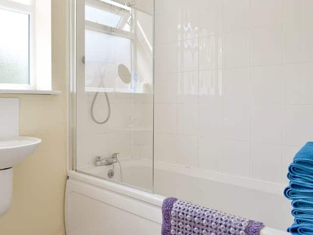 Family bathroom with shower over bath | Primrose - Clapham Holme Farm Cottages, Great Hatfield, near Hornsea