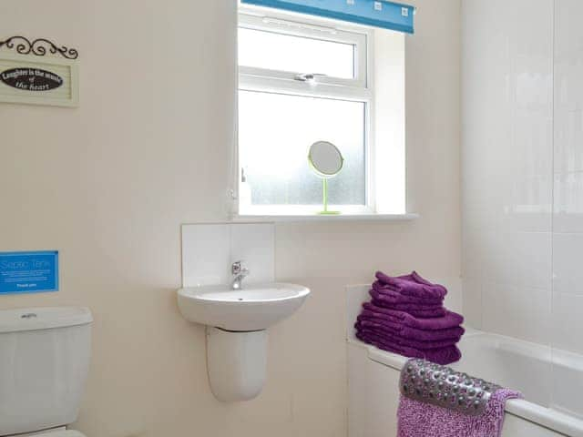 Family bathroom with shower over bath | Daffodil - Clapham Holme Farm Cottages, Great Hatfield, near Hornsea