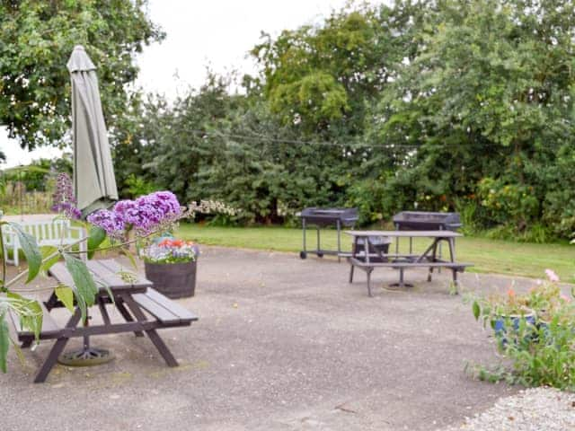 Shared outdoor patio and BBQ area | Clapham Holme Farm Cottages, Great Hatfield, near Hornsea