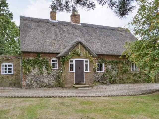 Idyllic front elevation of the holiday home | Thatched Cottage, Witton, near North Walsham