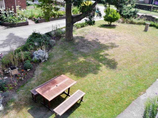 Lawned garden with sitting out area | Eventide, Broom, near Biggleswade