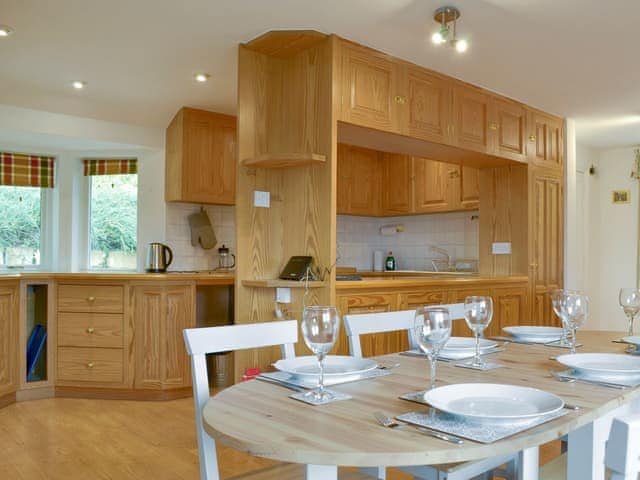 Extensive fitted kitchen with convenient dining area | Leyfield Coach House, Kirkby Lonsdale