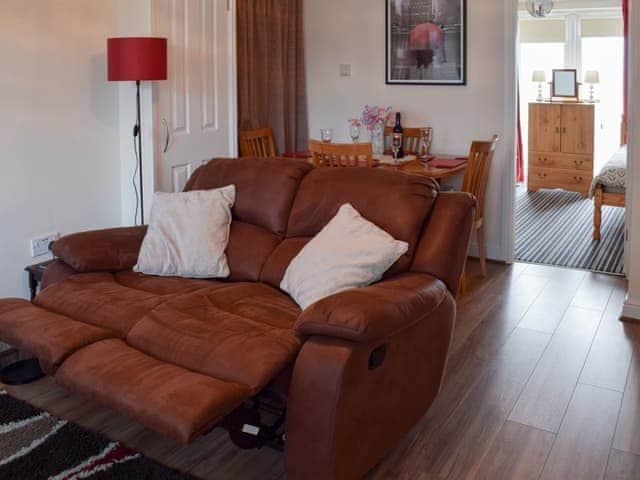 Living room with reclining sofa | The Annexe, Whitby