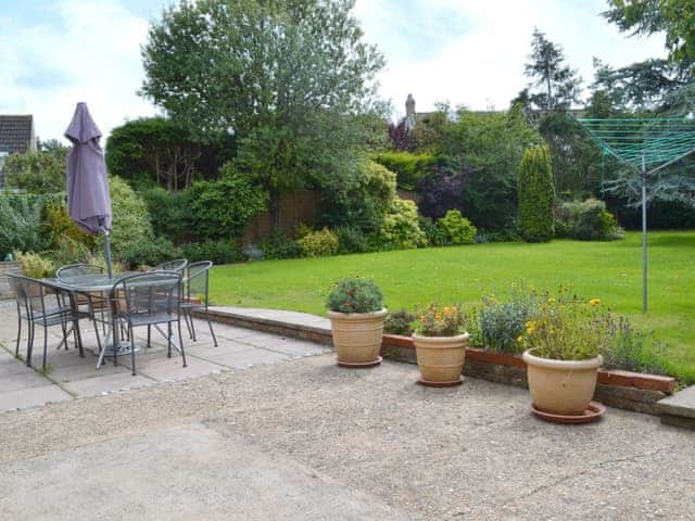 Attractive garden and patio area | Sea Glimpse, West Runton, near Sheringham