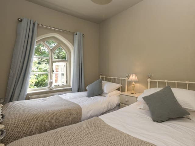 Tranquil bedroom with twin beds | Dell Cottage, Mundesley, near North Walsham