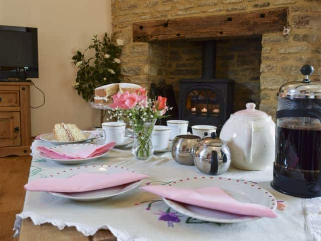 Beamed living room with wood-burning stove | Alfie&rsquo;s Barn, Ambrosden