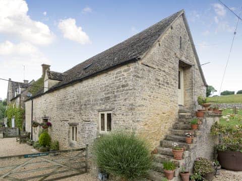 Beautifully converted detached Cotswold stone barn. Please note the external steps are only a decorative original feature. | Flowers Barn, Middle Duntisbourne, near Cirencester