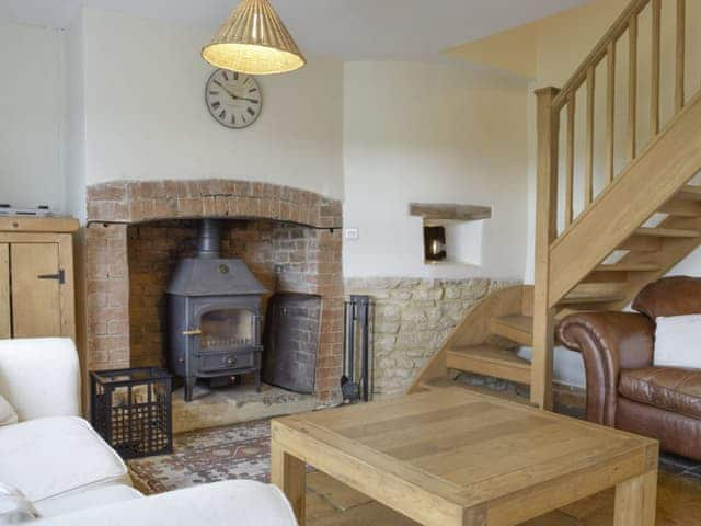 Cosy living area packed with heritage features | South View Cottage, Dean, near Chadlington