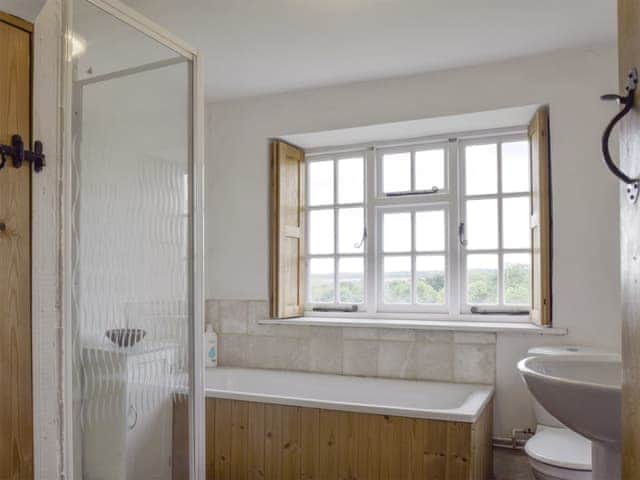 Family bathroom with separate bath and shower cubicle | South View Cottage, Dean, near Chadlington