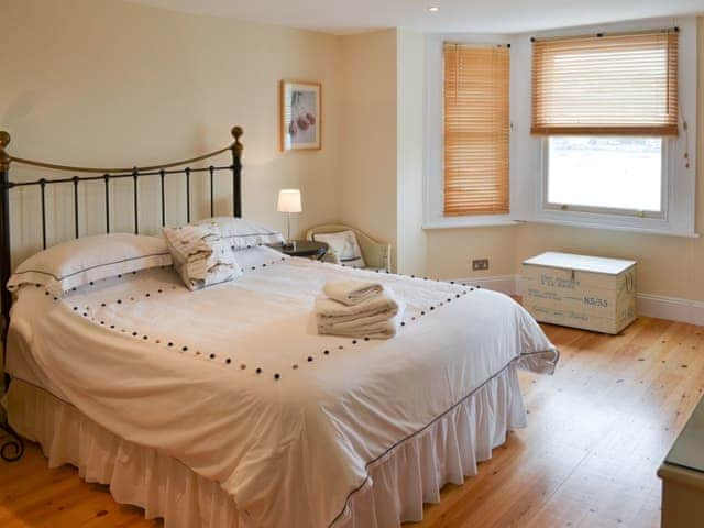 Delightful double bedroom with antique style bed | Tides Reach, Fowey