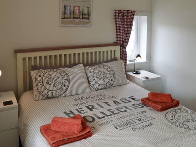 Relaxing bedroom with king-size bed and Freeview TV | Pottergate Cottage, Wroxham