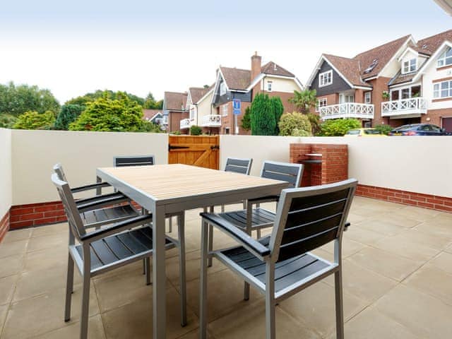 Private courtyard with built-in BBQ | Crested Grebe - The Riverviews, Wroxham, near Norwich