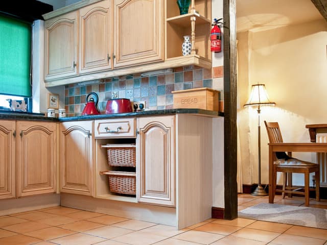 Delightful fitted kitchen and adjacent dining room | Staveley House Apartment - Staveley House & Staveley House Apartment, Staveley