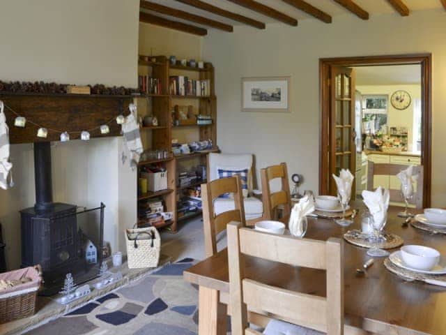 Dining area with wood burner | Blue House Cottage, Elsdon