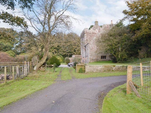 Approach to the impressive historic holiday home | Whitehall Pele Tower, Mealsgate