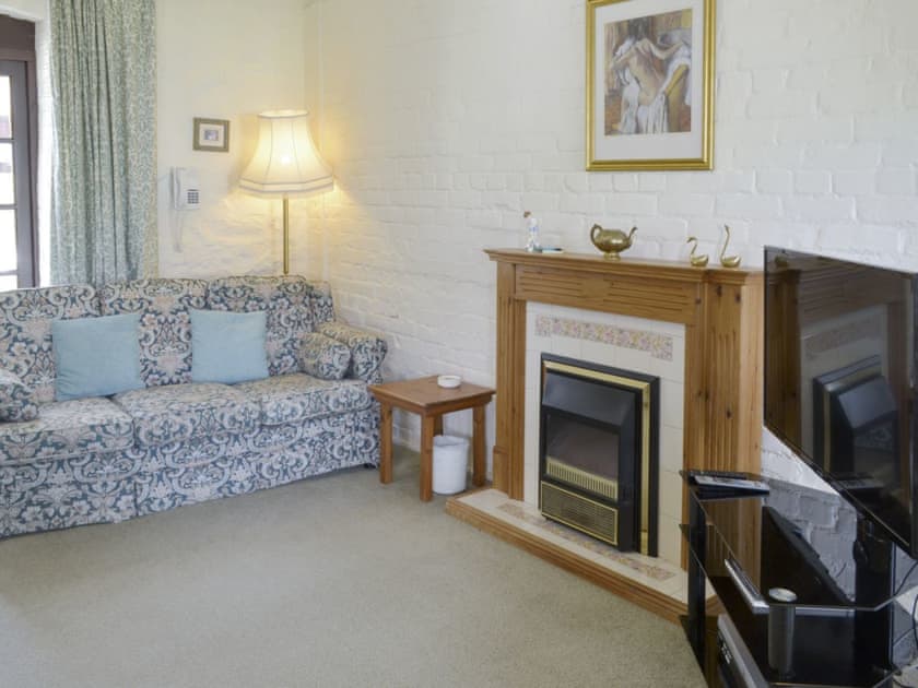 Welcoming living area | Crooklets - Kennacott Court Cottages, Widemouth, near Bude