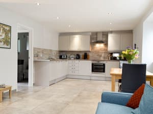Spacious kitchen area | Lloc Lo, Plas Cilybebyll, near Pontardawe