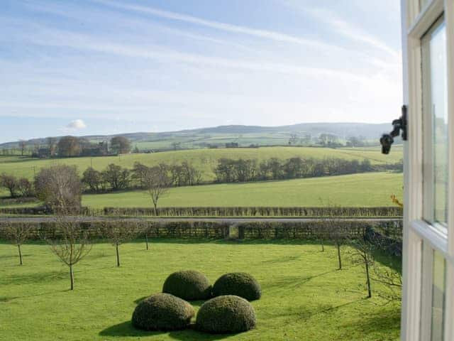 Stunning views over the garden and towards the surrounding countryside, from the bedroom | Micklethorn - Broughton Hall Estate, Broughton, near Skipton