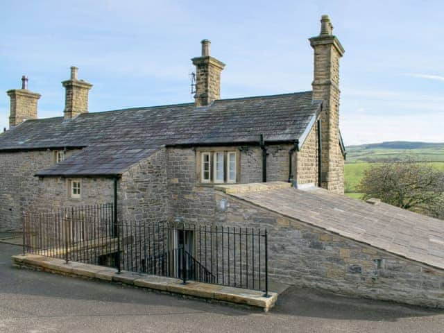 Rear of the property with stairs to the entrance | Micklethorn - Broughton Hall Estate, Broughton, near Skipton