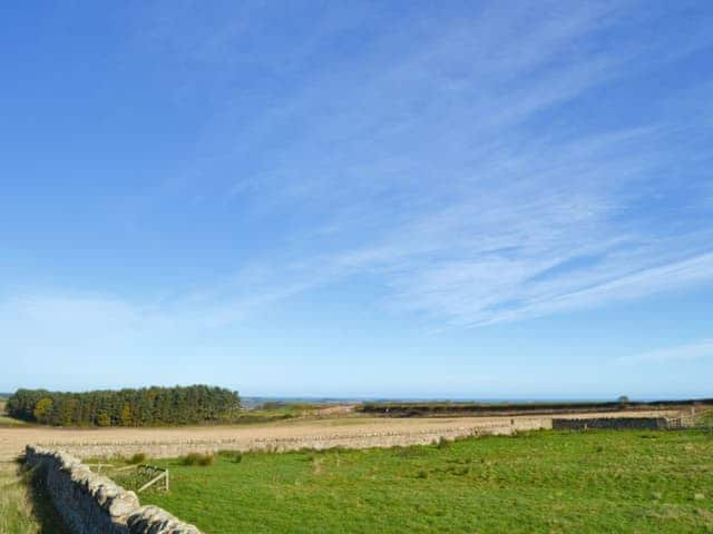 Stunning rural views towards the coastline from the patio | Wandylaw Farm Lodges - Outlook Cottage - Wandylaw Farm Cottages, Wandylaw, near Bamburgh