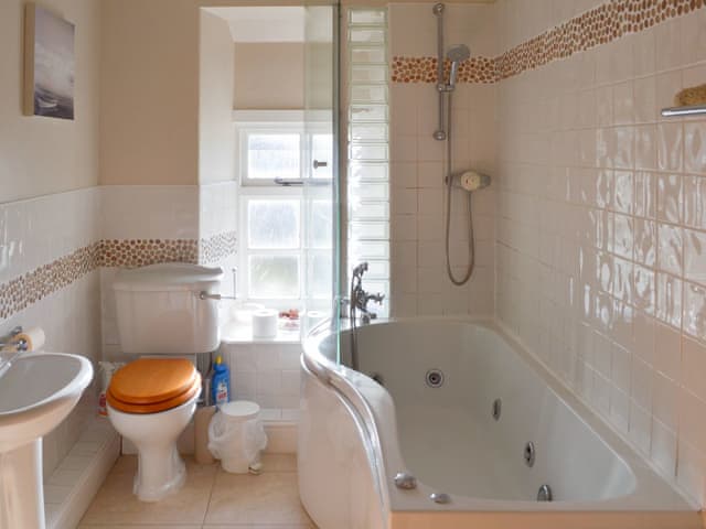 Bathroom with spa bath and shower over bath | Breasty Haw, Satterthwaite