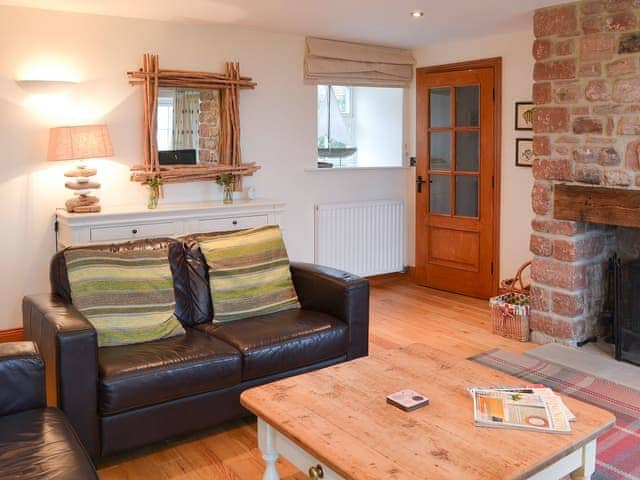 Delightful living room with wood burning stove | Bramble Barn, Beal near Holy Island