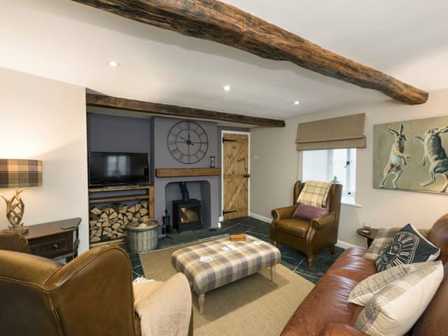 Stylishly furnished living room with wood burner | Crescent Cottage, Lowther, near Penrith