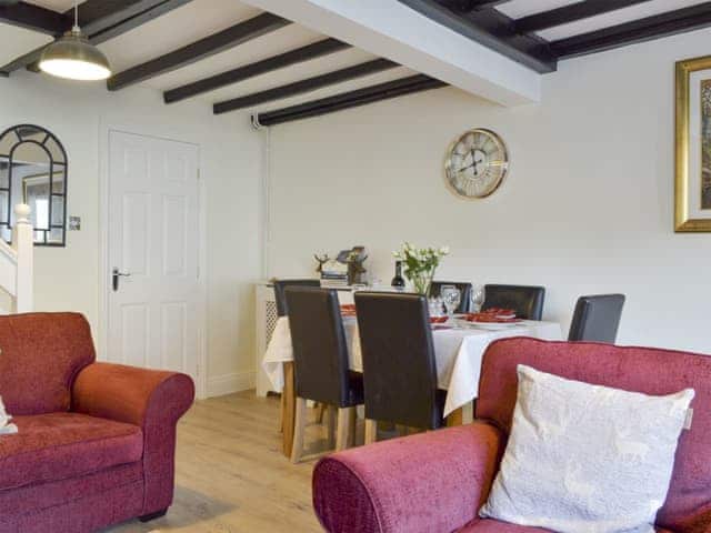 Convenient open plan living and dining room | Church Court Cottage, Beeford, near Hornsea