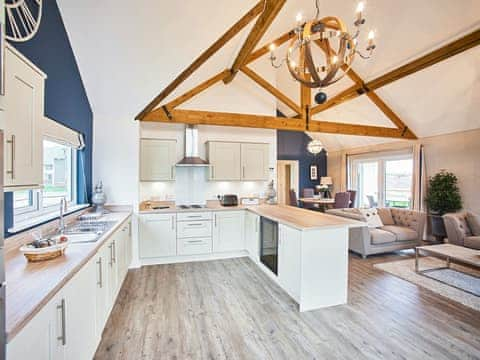 Well-equipped kitchen within an open-plan living area | Carmel, Beadnell, near Seahouses