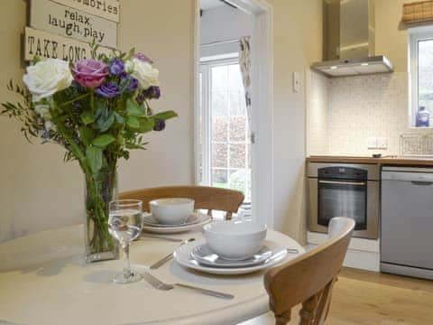 Convenient dining area within kitchen | Clinton Cottage, Yaxham, near Norwich