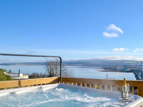 Relaxing hot tub with spectacular panoramic views over the waters of the inner Moray Firth | Balnacraig, Craigton, near Inverness