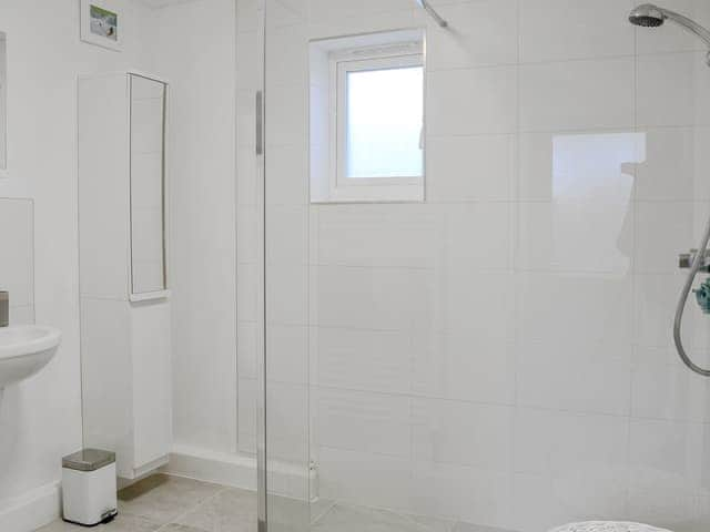 Shower room with walk in shower, toilet and heated towel rail | Katellen Cottage, Threlkeld, near Keswick