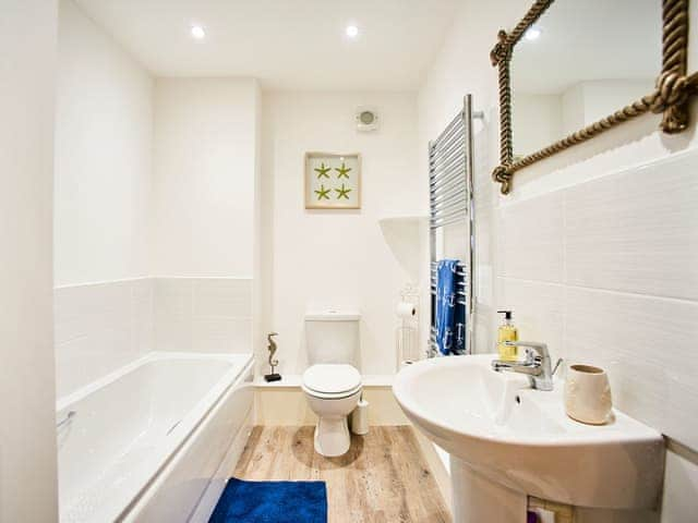 Family bathroom with heated towel rail | Carmel, Beadnell, near Seahouses