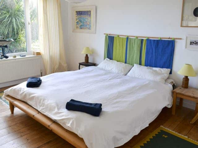 Relaxing bedroom with kingsize bed | Pollendor, Falmouth