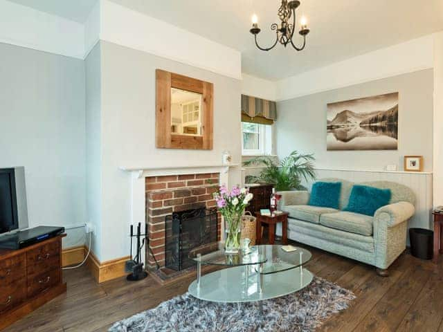 Stylishly furnished living room with open fire | Horseshoes House, Saham Toney, near Thetford