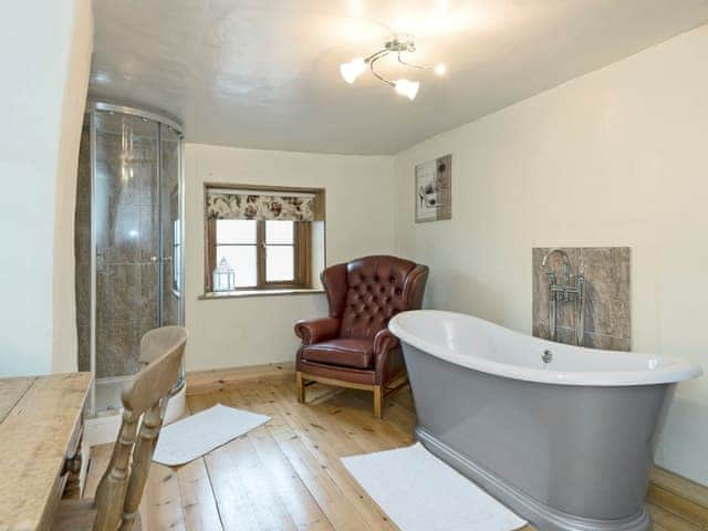 Sumptuous bathroom with roll-top bath | Horseshoes House, Saham Toney, near Thetford