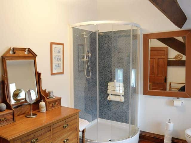 shower room with power shower and dressing table | Woodpecker Cottage - Wallace Lane Farm Cottages, Brocklebank, near Caldbeck and Uldale