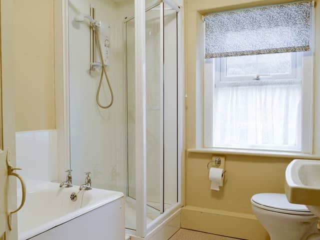 Family bathroom with bath and separate shower cubicle | Brasscam, Seatoller