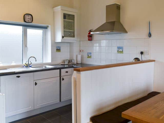 Kitchen and dining area | Barn Cottage - Quinceborough Farm, Widemouth Bay, near Bude