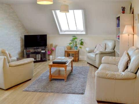 Well presented open plan living room | 12 Maritime House, Bridport