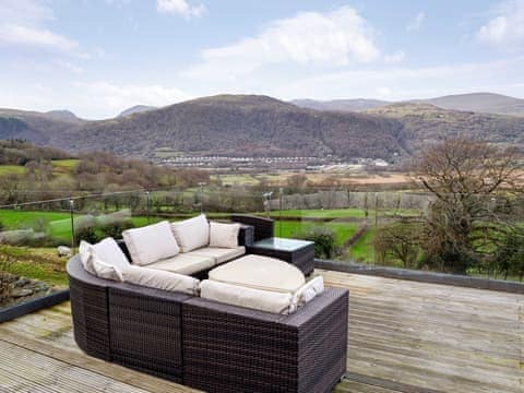  Large decked area with sitting-out area, garden furniture and gas BBQ | Bryn Hyfryd, Maenan, near Llanrwst