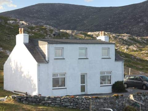 Delightful holiday cottage in the shadow of rugged Hebridean hills | Tigh Mairi, Carragrich, near Tarbert, Isle of Harris