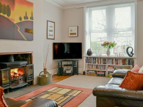 Wonderful living room with a roaring wood burner | Poppy Cottage, Hebden, near Grassington