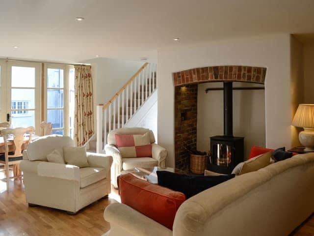 Cosy living room with wood burner | The Coach House, Chulmleigh, near South Molton