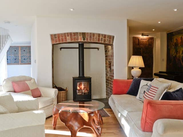 Cosy living room with wood burner | The Coach House, Chulmleigh, near South Molton