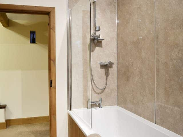 Family bathroom with shower over bath | Little Meadow - West House Farm, Dearham, near Maryport