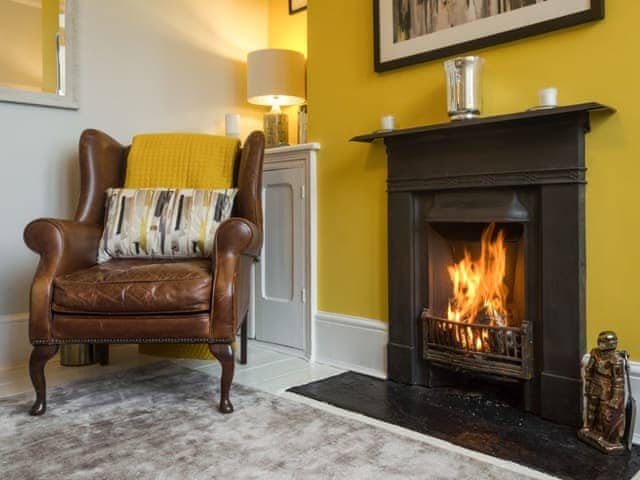 Cosy living room with open fire | Coastguard Retreat, Ramsgate